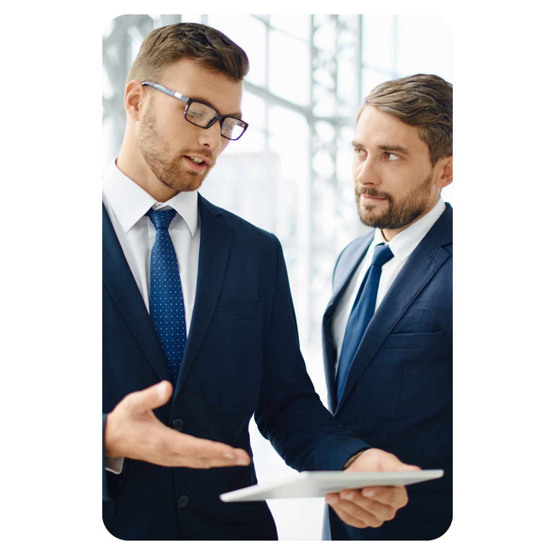 Two lawyers reviewing a construction file